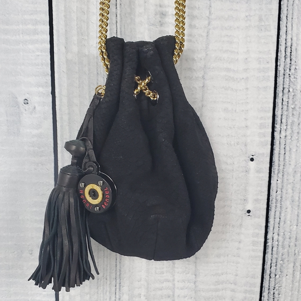 ❤ Henri Bendel black and gold leather pouch purse